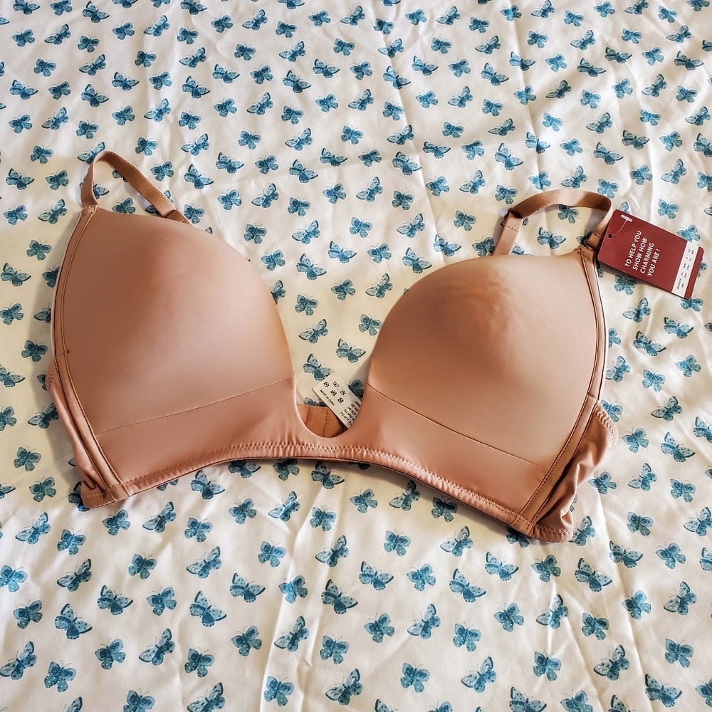 Women's size 38D nude color deep cleavage bra.